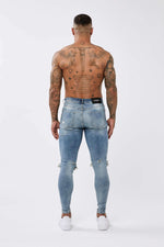 SKINNY FIT JEANS RIPPED & REPAIRED - STRONG WASHED DARK BLUE